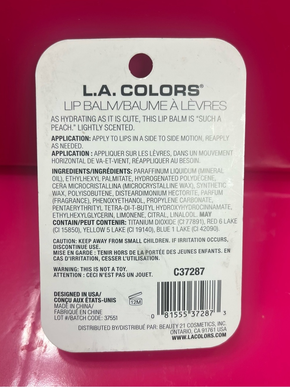 L.A. COLORS Peach Chick Scented Lip Balm - Yellow with Pink Accents - Picture 2 of 2